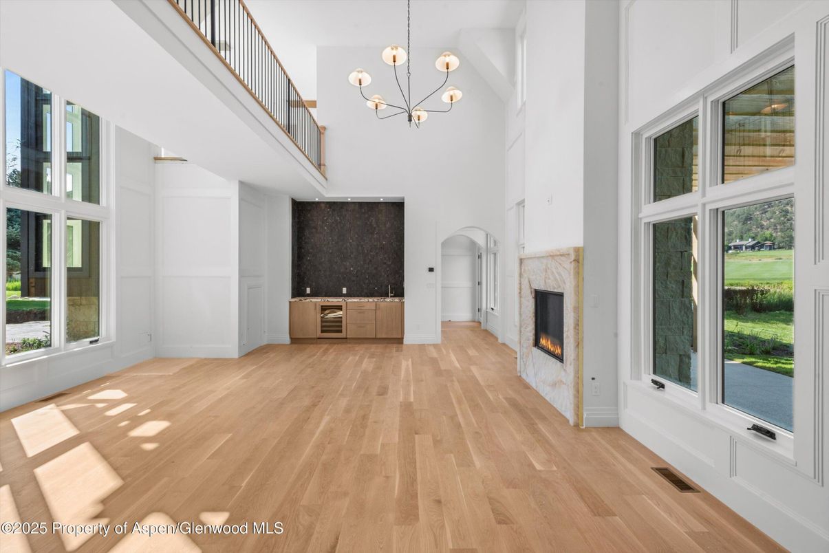 Chandelier, Empty room, Fireplace, Interior, Pendant Lights, Wood Texture Flooring