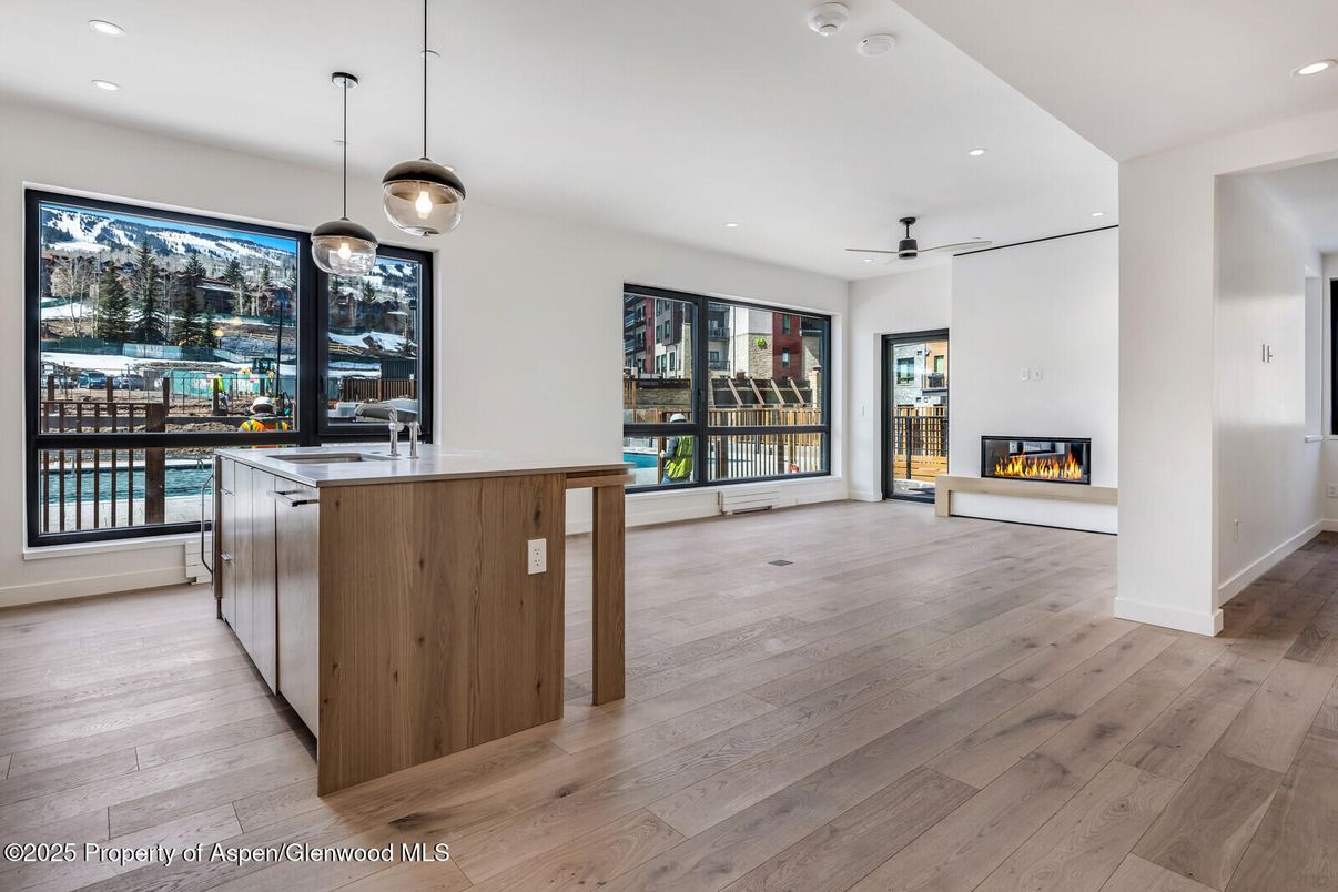 Fireplace, Interior, Kitchen, Pendant Lights, Recessed Lighting, Wood Texture Flooring
