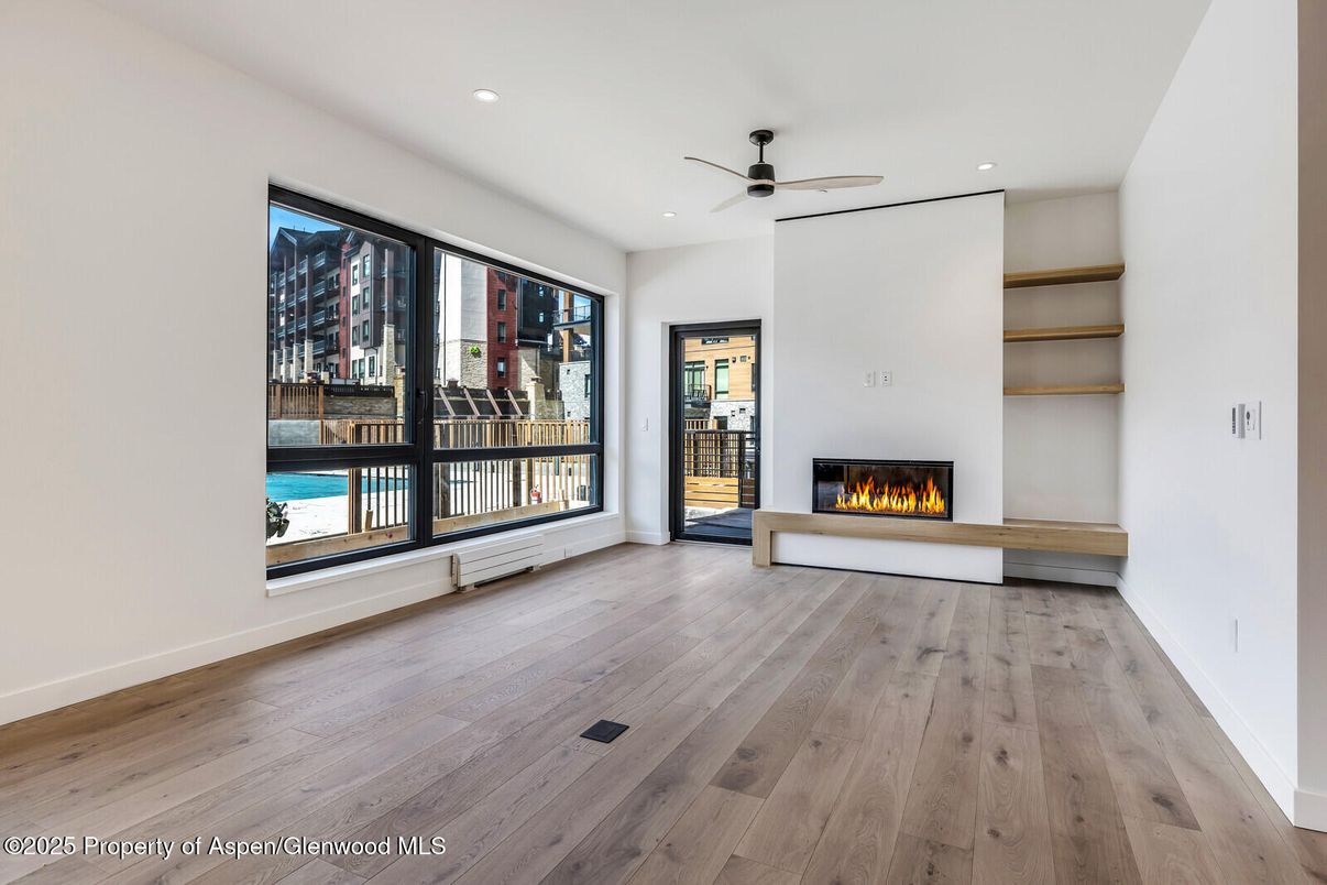 Empty room, Fireplace, Interior, Recessed Lighting, Wood Texture Flooring