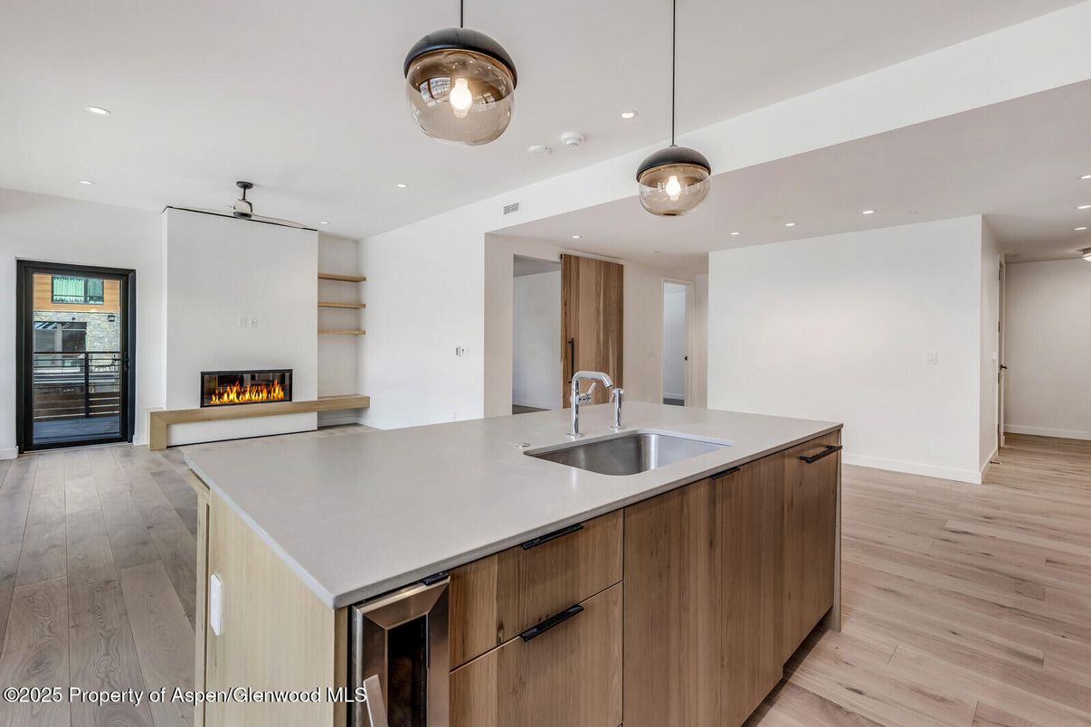 Fireplace, Interior, Kitchen, Pendant Lights, Recessed Lighting, Wood Texture Flooring