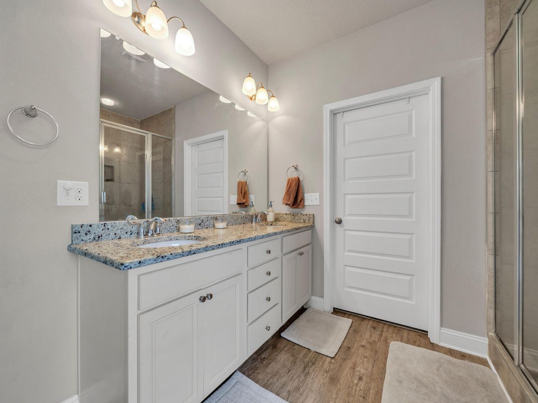 Bathroom, Dual Sink Vanities, Glass Shower, Interior, Wood Texture Flooring
