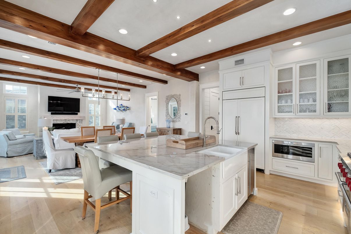 Dining room, Fireplace, Interior, Kitchen, Living room, Pendant Lights, Recessed Lighting, Stainless Steel Appliances, Wooden Beams, Wood Texture Flooring