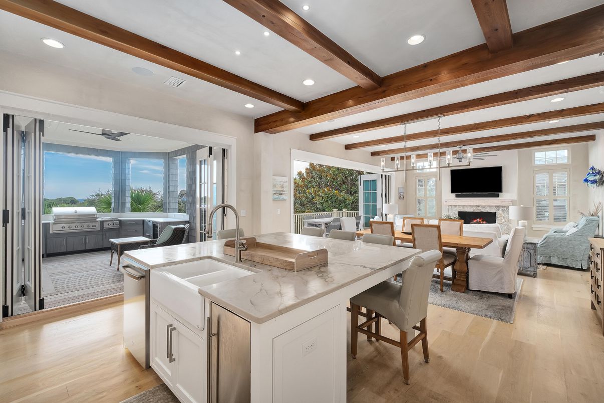 Dining room, Fireplace, Interior, Kitchen, Living room, Pendant Lights, Recessed Lighting, Stainless Steel Appliances, Wooden Beams, Wood Texture Flooring