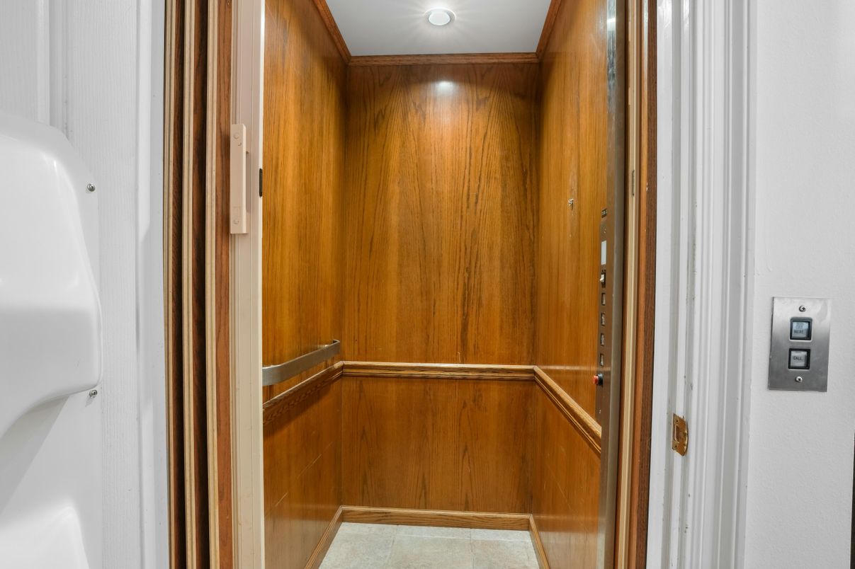 Elevator, Interior, Recessed Lighting, Wooden Walls