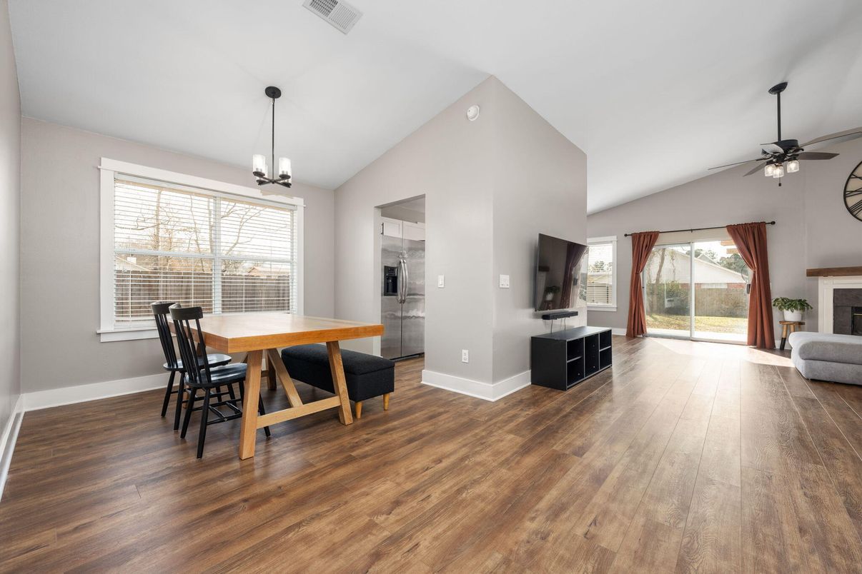 Dining room, Fireplace, Interior, Pendant Lights, Wood Texture Flooring