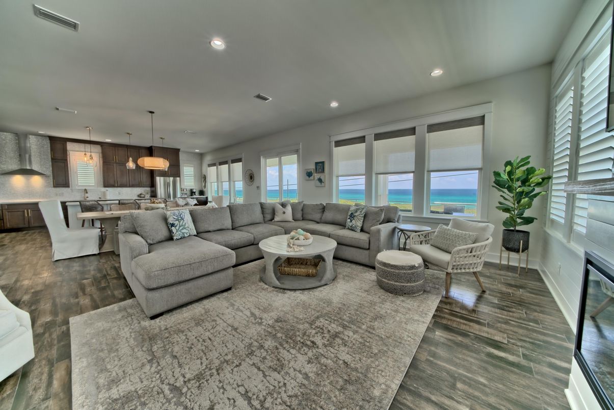 Dining room, Interior, Kitchen, Living room, Pendant Lights, Recessed Lighting, Stainless Steel Appliances, Water, Wood Texture Flooring