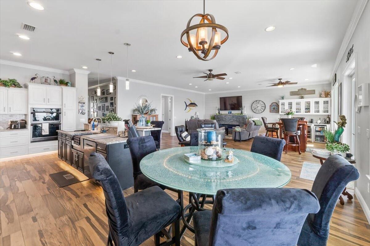Dining room, Interior, Kitchen, Living room, Pendant Lights, Recessed Lighting, Wood Texture Flooring