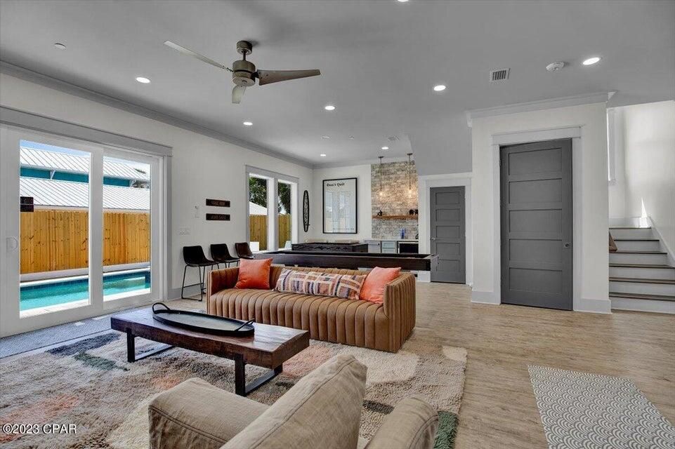 Interior, Living room, Pendant Lights, Recessed Lighting, Stone Walls, Wood Texture Flooring