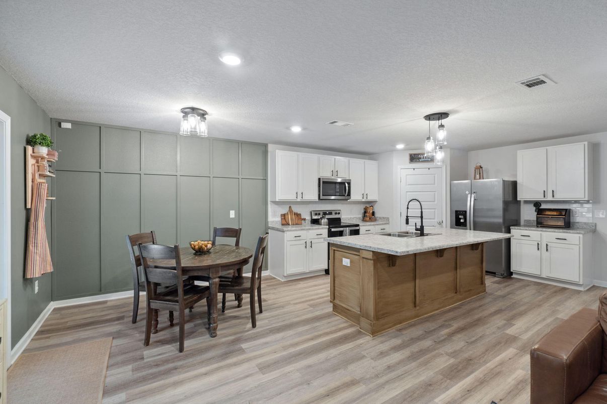 Dining room, Interior, Kitchen, Pendant Lights, Recessed Lighting, Stainless Steel Appliances, Wood Texture Flooring