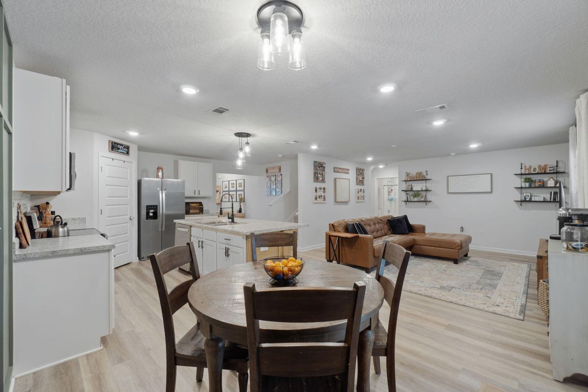 Dining room, Interior, Kitchen, Living room, Recessed Lighting, Stainless Steel Appliances, Wood Texture Flooring