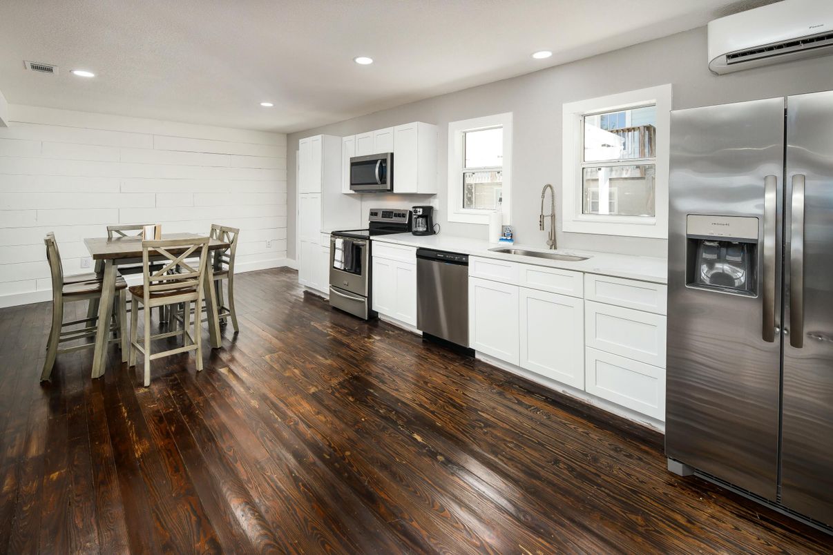 Dining room, Interior, Kitchen, Recessed Lighting, Stainless Steel Appliances, Wood Texture Flooring