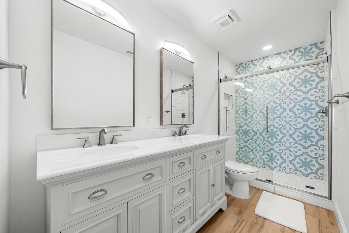 Bathroom, Dual Sink Vanities, Glass Shower, Interior, Recessed Lighting, Wood Texture Flooring