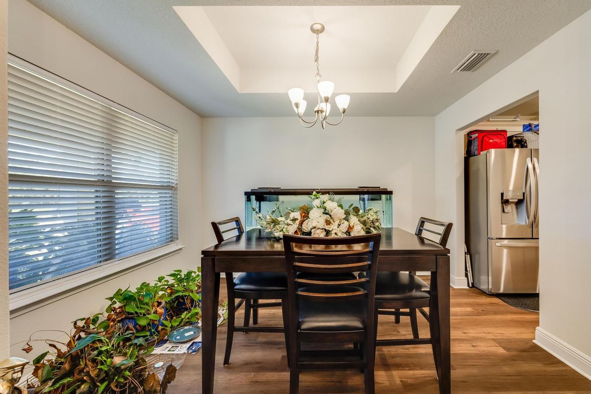 Chandelier, Dining room, Interior, Pendant Lights, Stainless Steel Appliances, Wood Texture Flooring