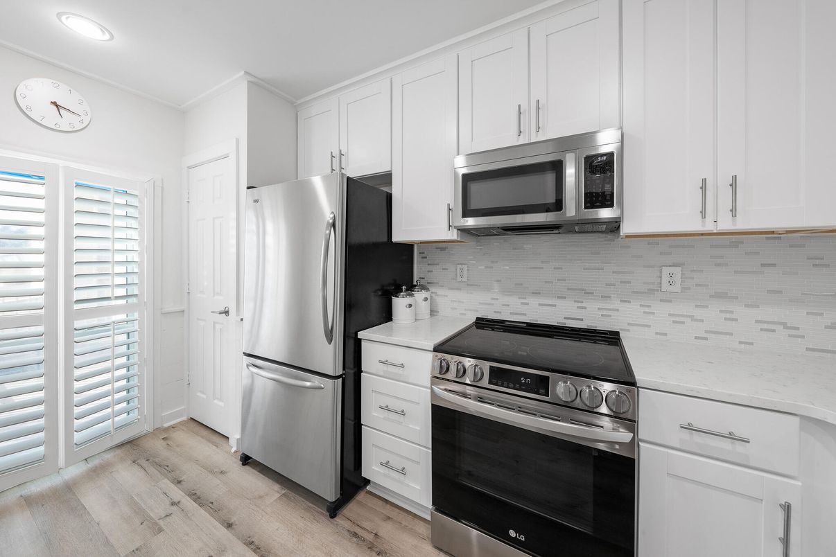 Interior, Kitchen, Recessed Lighting, Stainless Steel Appliances, Wood Texture Flooring