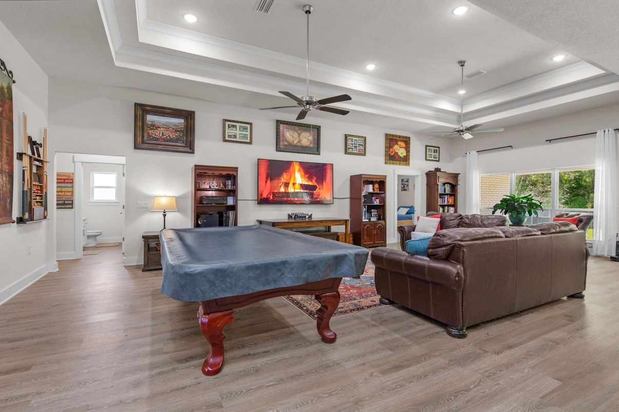 Billiard Table, Fireplace, Game Room, Interior, Living room, Recessed Lighting, Wood Texture Flooring