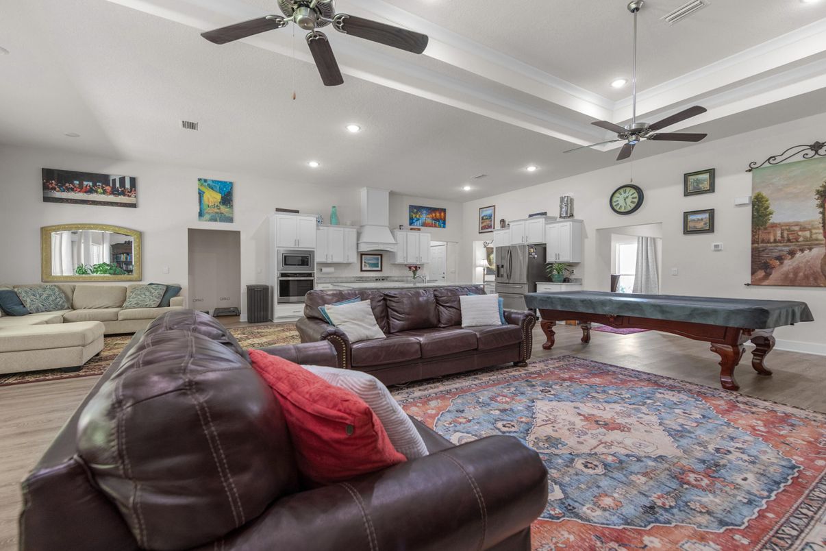 Billiard Table, Game Room, Interior, Kitchen, Living room, Recessed Lighting, Stainless Steel Appliances, Wood Texture Flooring