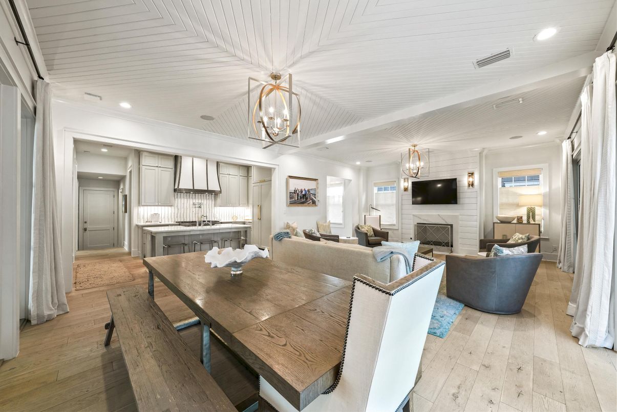 Chandelier, Dining room, Fireplace, Interior, Kitchen, Living room, Pendant Lights, Recessed Lighting, Stainless Steel Appliances, Wood Texture Flooring