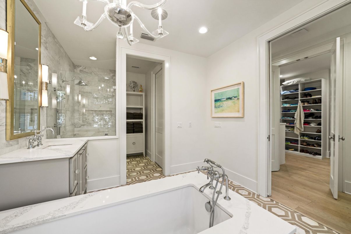 Bathroom, Dual Sink Vanities, Free Standing Baths, Glass Shower, Interior, Marble, Marble Walls, Recessed Lighting, Walk-in Closets, Wood Texture Flooring