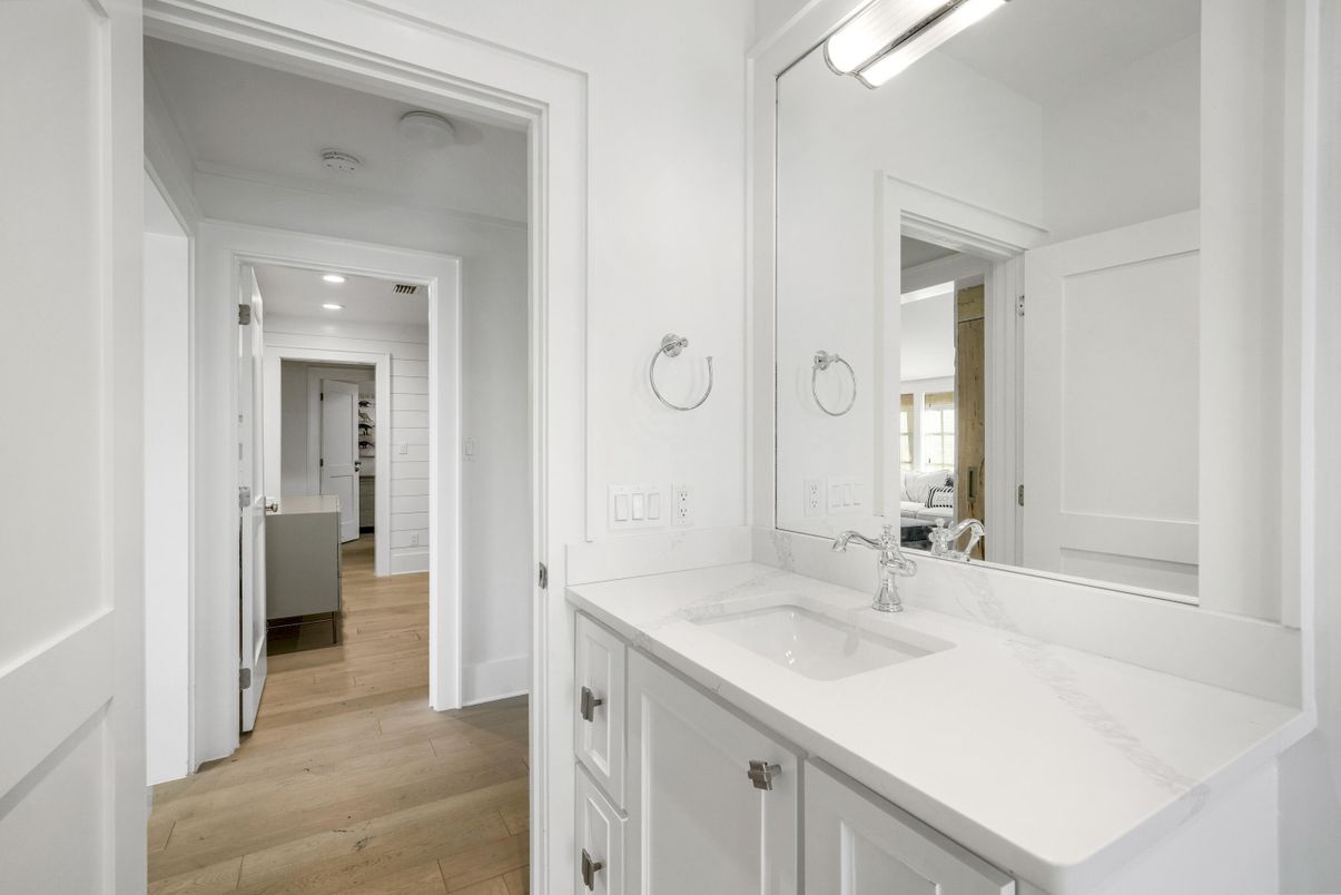 Bathroom, Dual Sink Vanities, Interior, Recessed Lighting, Wood Texture Flooring