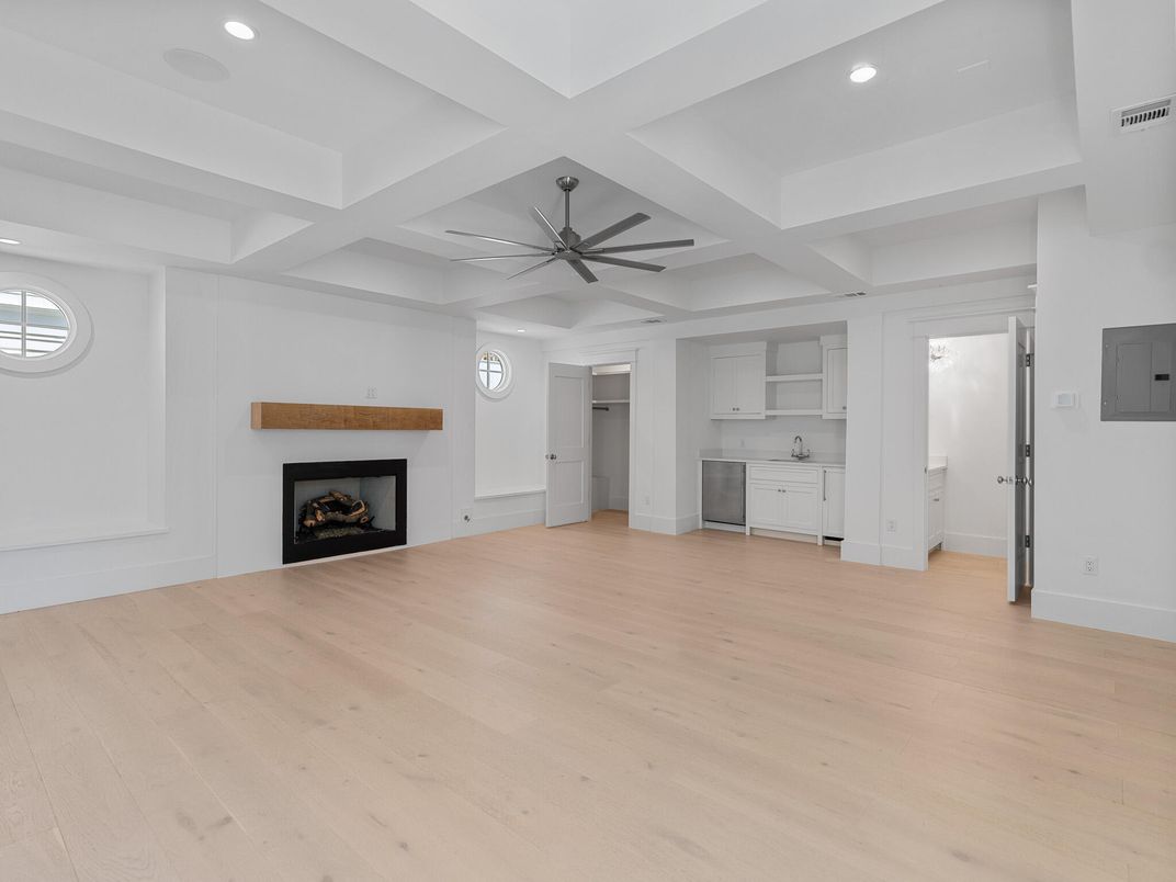 Empty room, Fireplace, Interior, Recessed Lighting, Wood Texture Flooring