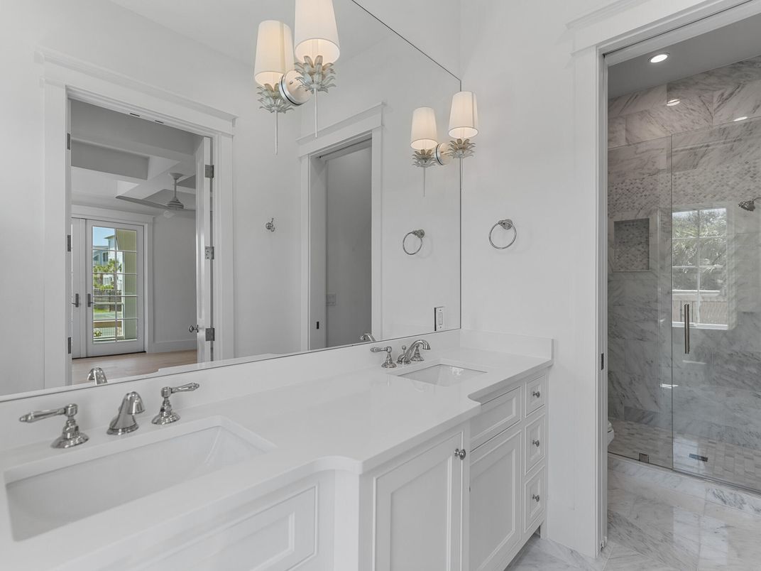 Bathroom, Dual Sink Vanities, Glass Shower, Interior, Marble, Marble Walls, Recessed Lighting