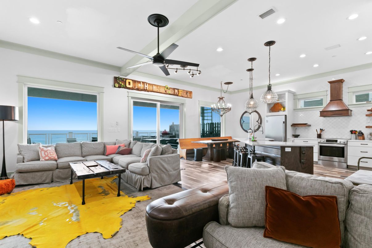 Dining room, Interior, Kitchen, Living room, Pendant Lights, Recessed Lighting, Stainless Steel Appliances, Water, Wood Texture Flooring