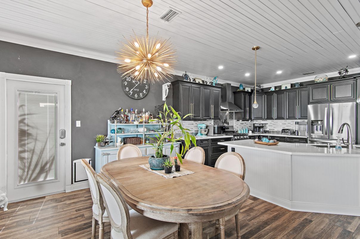 Dining room, Interior, Kitchen, Pendant Lights, Recessed Lighting, Stainless Steel Appliances, Wood Texture Flooring