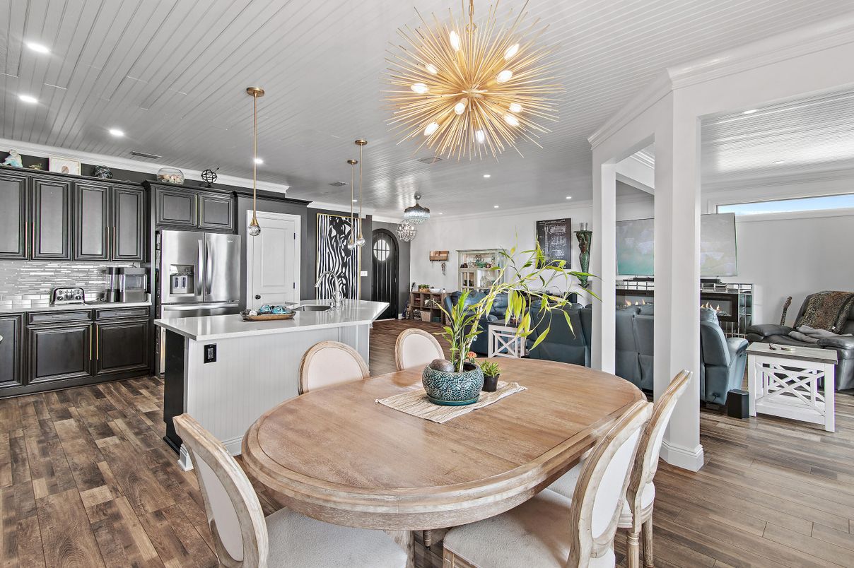 Dining room, Interior, Kitchen, Pendant Lights, Recessed Lighting, Stainless Steel Appliances, Wood Texture Flooring