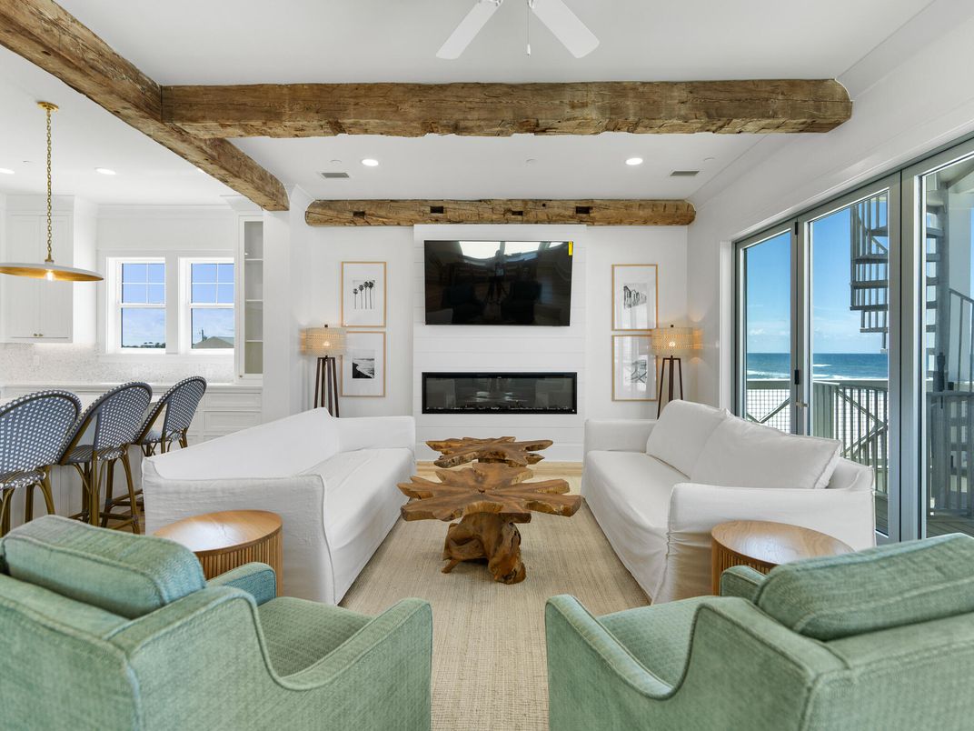 Dining room, Fireplace, Interior, Living room, Pendant Lights, Recessed Lighting, Water, Wooden Beams