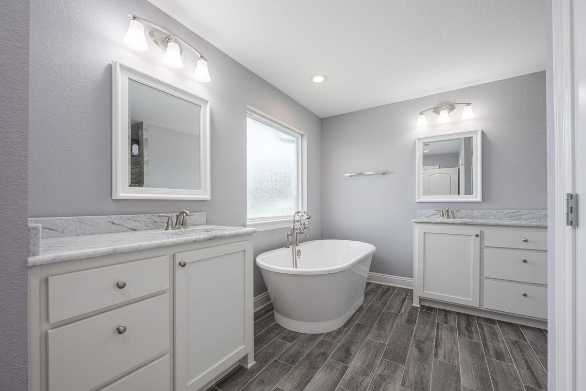 Bathroom, Dual Sink Vanities, Free Standing Baths, Interior, Recessed Lighting, Wood Texture Flooring