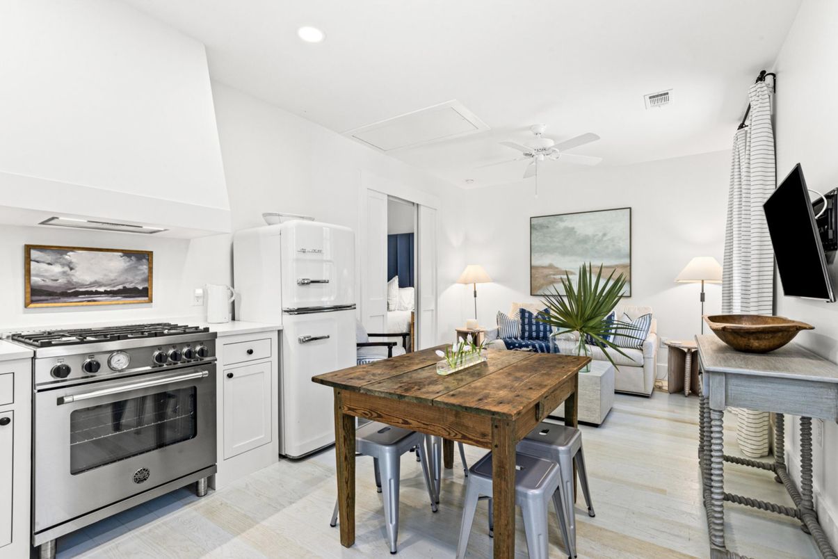 Dining room, Interior, Kitchen, Living room, Recessed Lighting, Stainless Steel Appliances, Wood Texture Flooring
