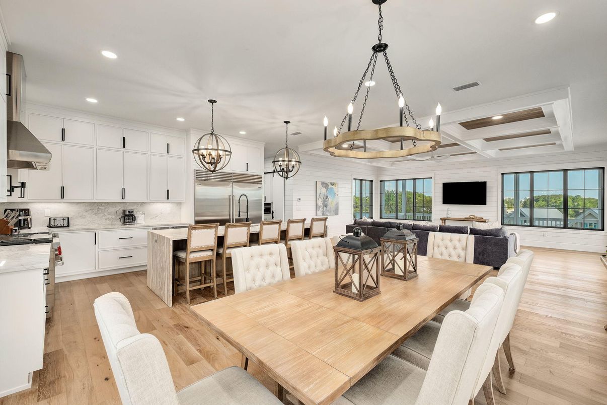 Chandelier, Dining room, Interior, Kitchen, Living room, Pendant Lights, Recessed Lighting, Stainless Steel Appliances, Wood Texture Flooring
