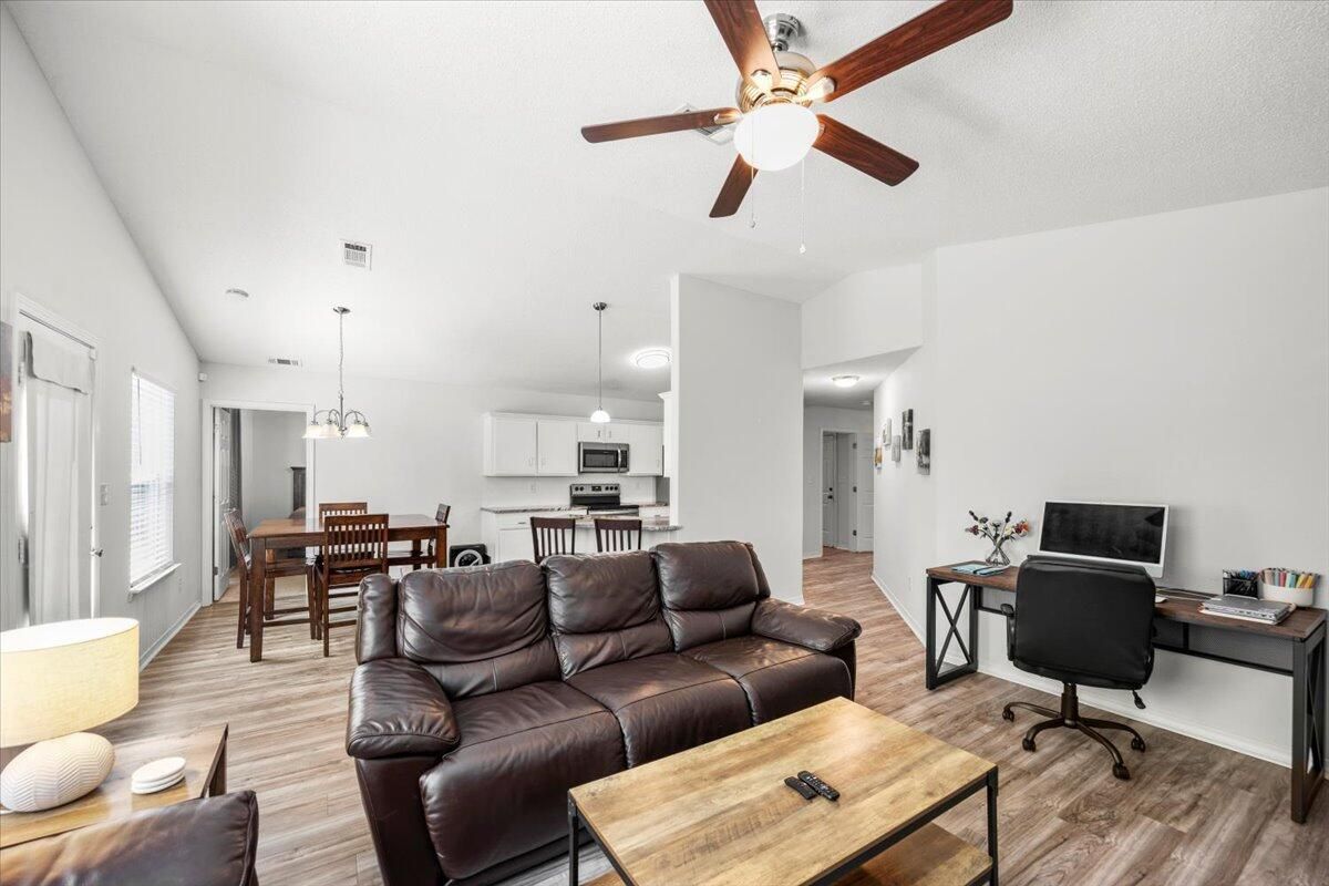 Dining room, Interior, Kitchen, Living room, Pendant Lights, Stainless Steel Appliances, Wood Texture Flooring