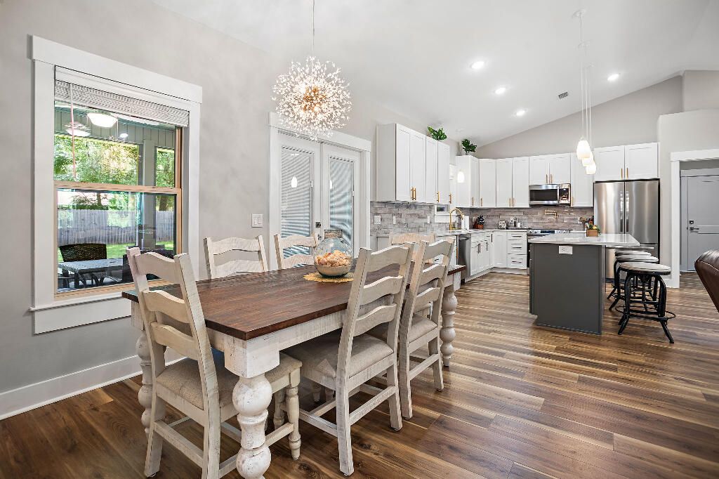 Chandelier, Dining room, Interior, Kitchen, Pendant Lights, Recessed Lighting, Stainless Steel Appliances, Wood Texture Flooring