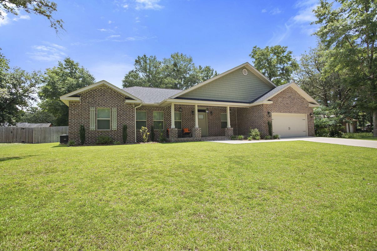 Attached, Backyard, Exterior, Facade, Brick Facade, Ranch