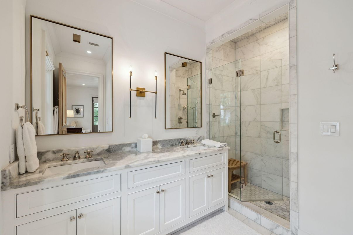 Bathroom, Dual Sink Vanities, Glass Shower, Interior, Marble Walls, Recessed Lighting