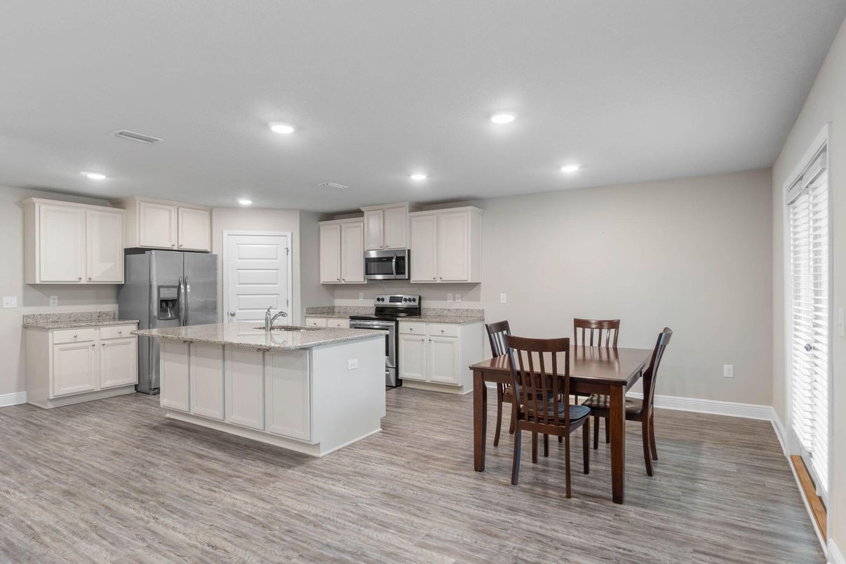 Dining room, Interior, Kitchen, Recessed Lighting, Stainless Steel Appliances, Wood Texture Flooring