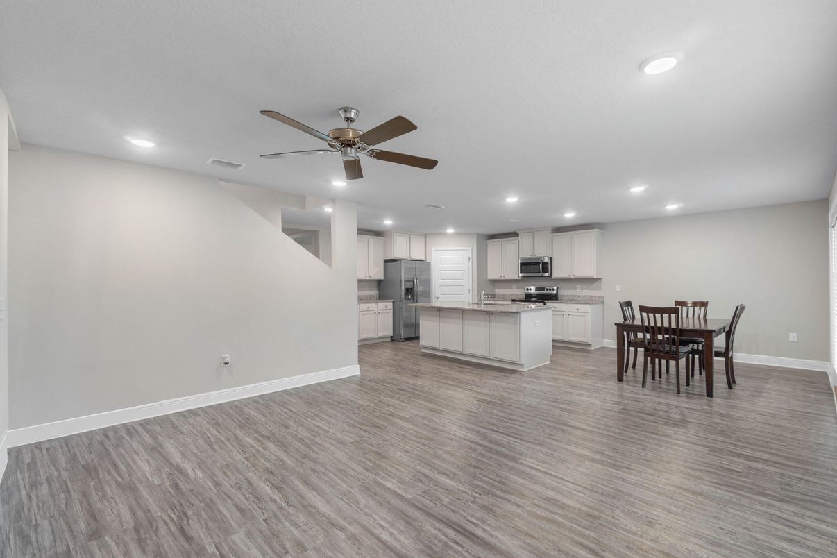 Dining room, Interior, Kitchen, Recessed Lighting, Stainless Steel Appliances, Wood Texture Flooring