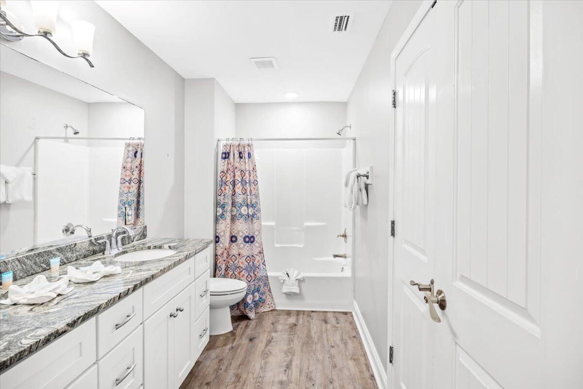 Bathroom, Dual Sink Vanities, Interior, Recessed Lighting, Wood Texture Flooring