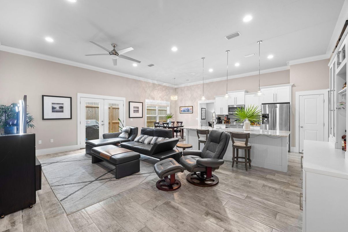 Dining room, Interior, Kitchen, Living room, Pendant Lights, Recessed Lighting, Stainless Steel Appliances, Wood Texture Flooring