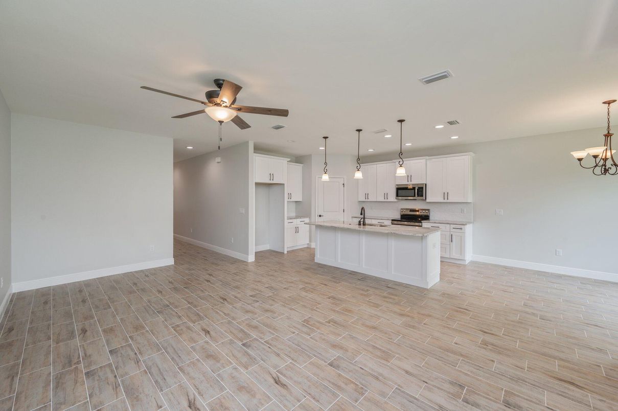 Chandelier, Empty room, Interior, Kitchen, Pendant Lights, Recessed Lighting, Wood Texture Flooring