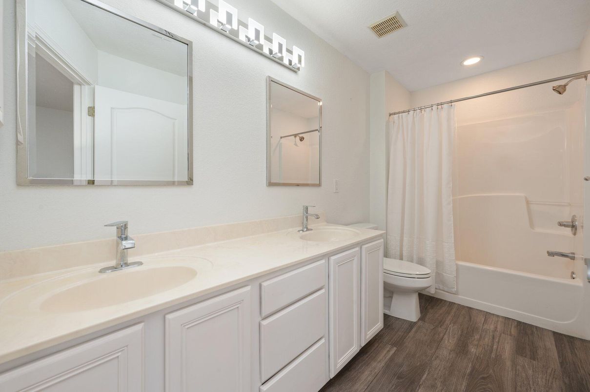 Bathroom, Dual Sink Vanities, Interior, Recessed Lighting, Wood Texture Flooring