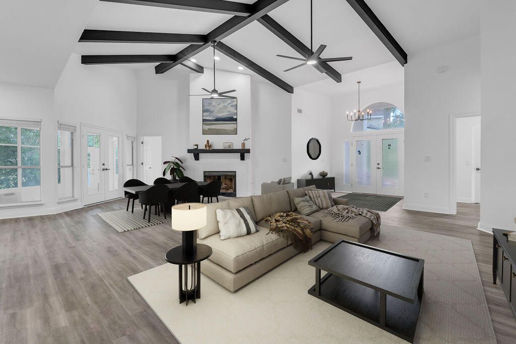 Chandelier, Dining room, Fireplace, Interior, Living room, Pendant Lights, Recessed Lighting, Wooden Beams, Wood Texture Flooring