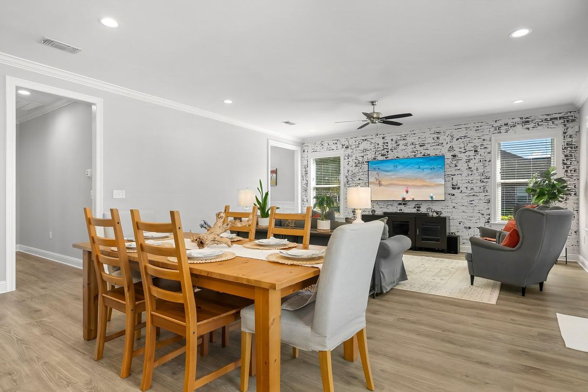 Dining room, Fireplace, Interior, Living room, Recessed Lighting, Wood Texture Flooring