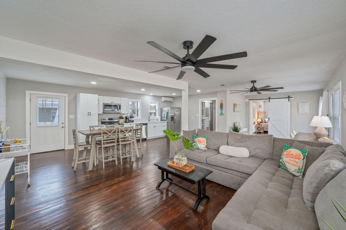 Dining room, Interior, Kitchen, Living room, Recessed Lighting, Stainless Steel Appliances, Wood Texture Flooring