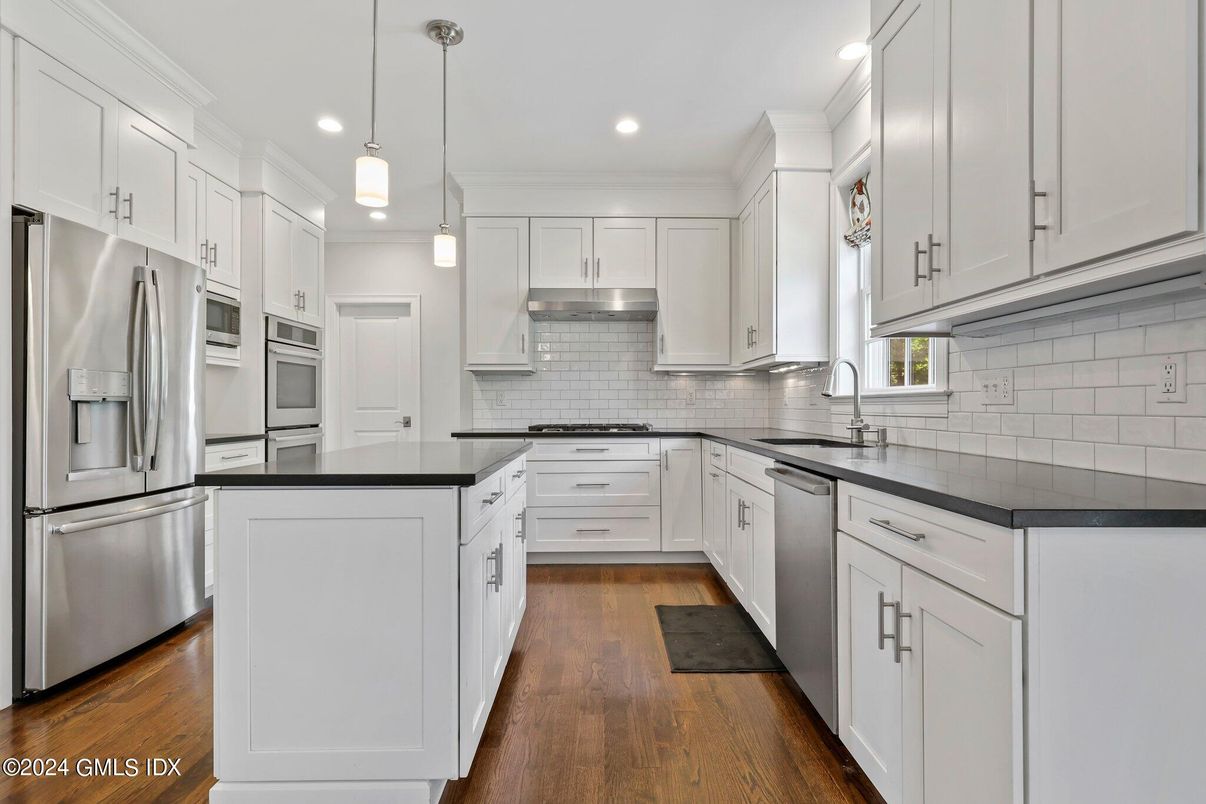 Interior, Kitchen, Pendant Lights, Recessed Lighting, Stainless Steel Appliances, Wood Texture Flooring