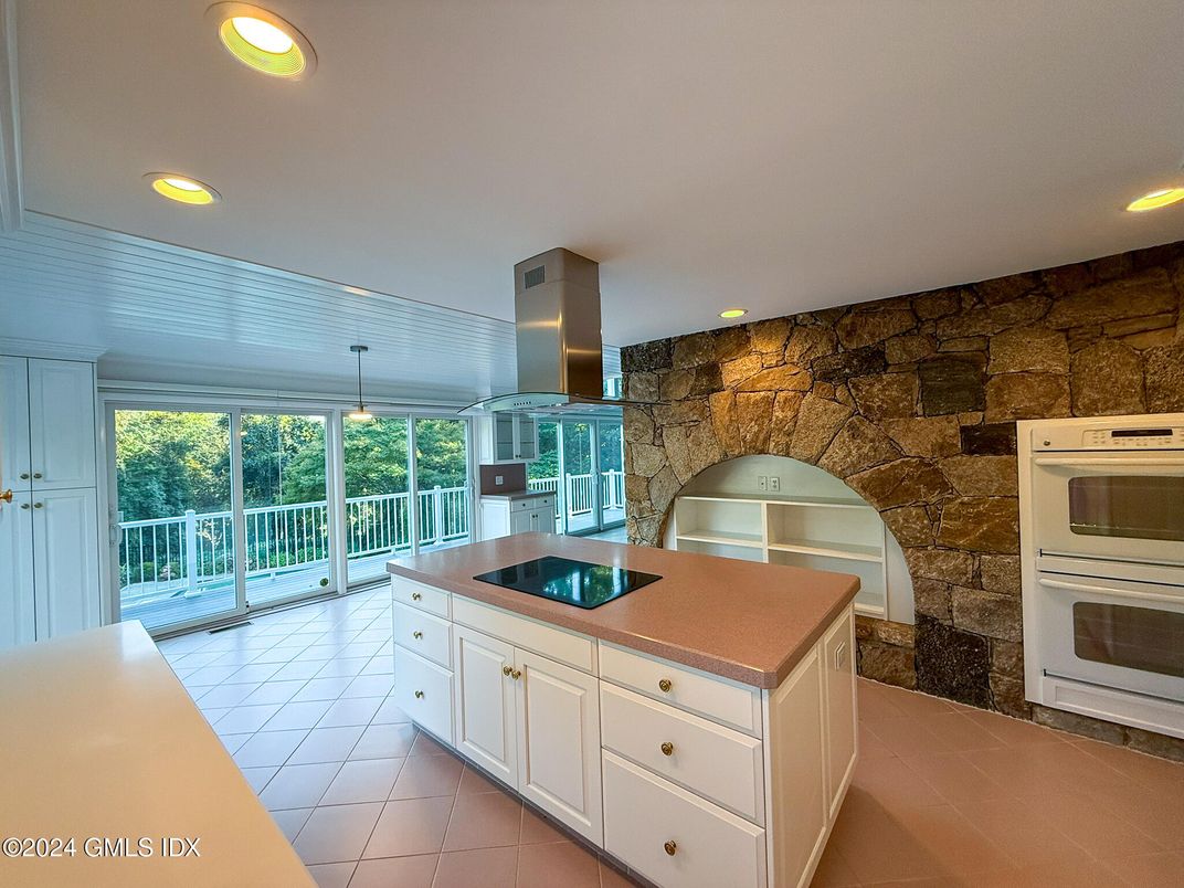 Interior, Kitchen, Recessed Lighting, Stainless Steel Appliances, Stone Walls