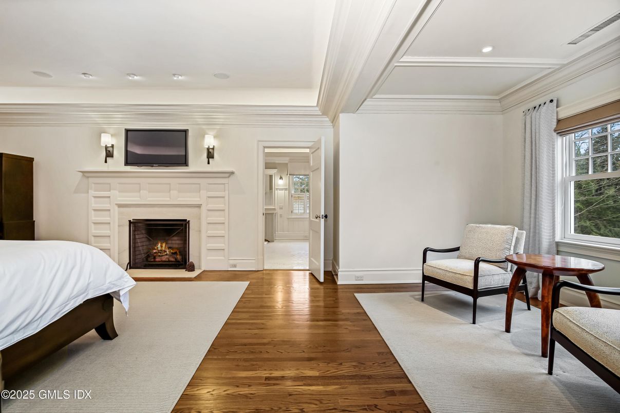 Bedroom, Fireplace, Interior, Recessed Lighting, Wood Texture Flooring