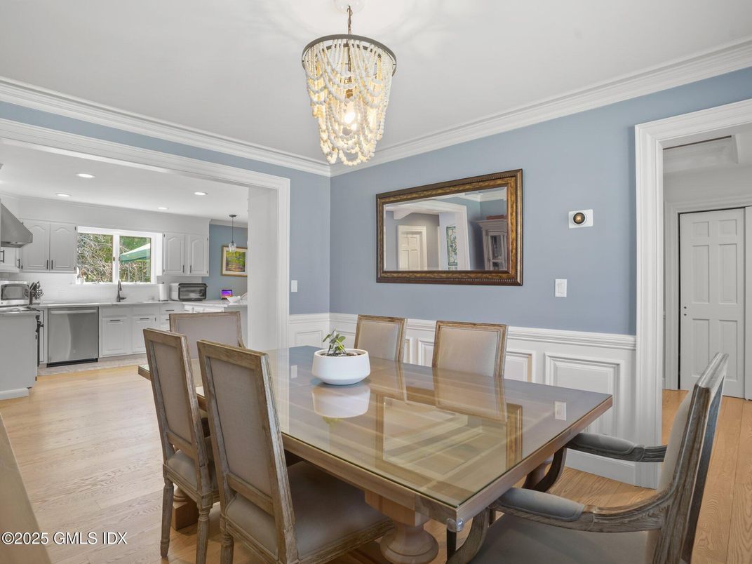 Chandelier, Dining room, Interior, Kitchen, Pendant Lights, Recessed Lighting, Stainless Steel Appliances, Wood Texture Flooring