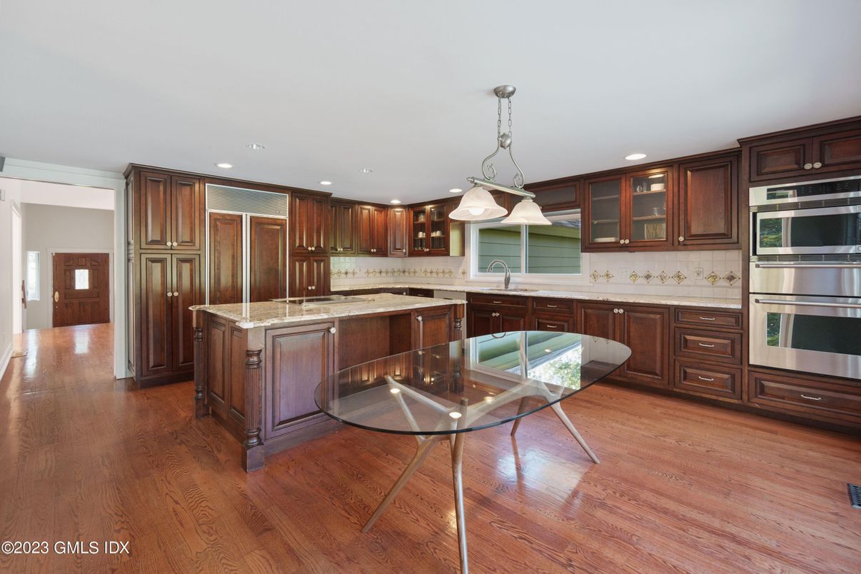 Dining room, Interior, Kitchen, Pendant Lights, Recessed Lighting, Stainless Steel Appliances, Wood Texture Flooring